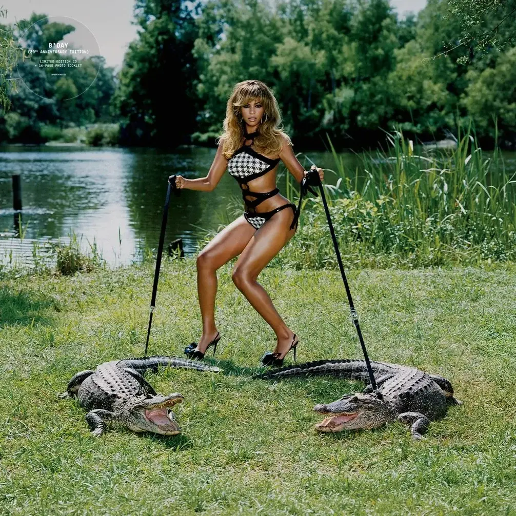 Beyoncé B'Day 20th Anniversary Edition album cover holding two alligators on leashes in houndstooth bikini