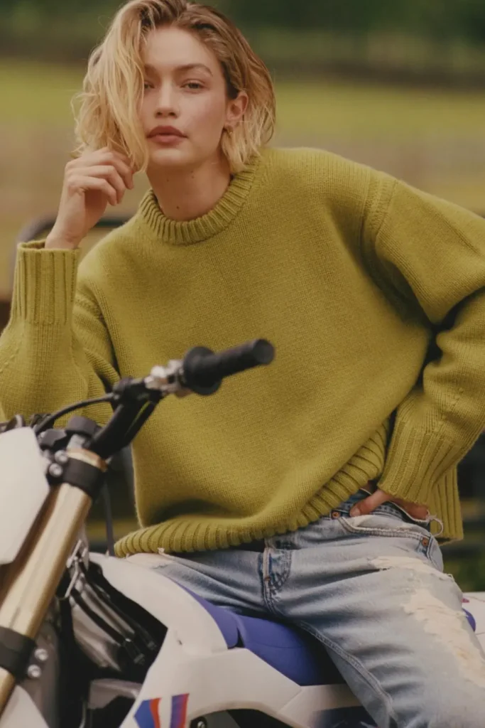 Gigi Hadid wearing cashmere knitwear from her brand Guest in Residence