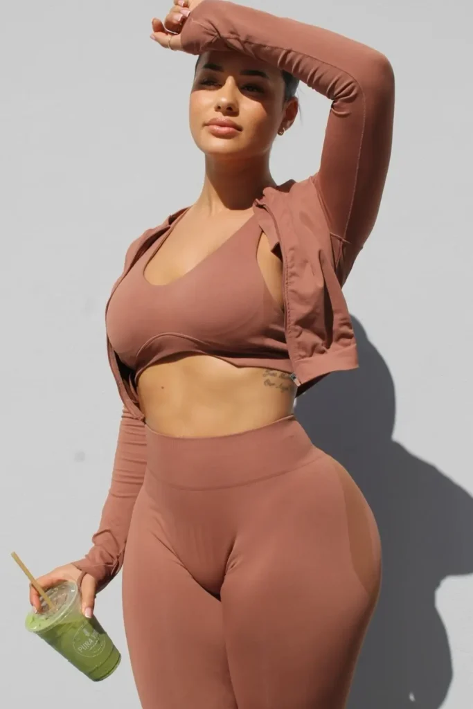Katya Elise Henry promoting her fitness coaching and training products